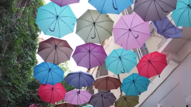 Little Girl Walks Alley Nicosia Cyprus Multi Colored Umbrellas Covering — Stockvideo