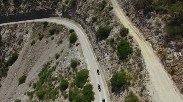 Aerial Motorcycle Riders Riding Motorbike Mountain Roads — Stock video