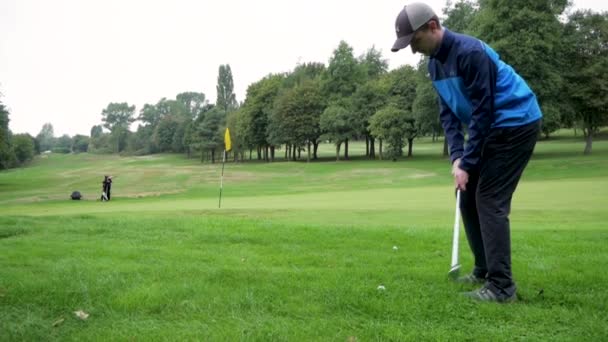 Slow Motion Chip Shot Out Rough Green — Video