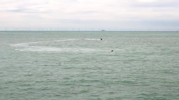 Background Shot Offshore Wind Generator Farm Brighton Power Boat Sails — Vídeos de Stock