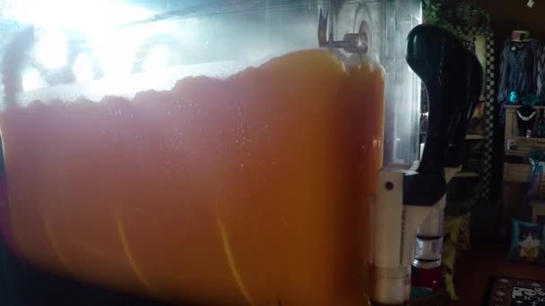 Slow Motion Slurpee Machine Orange Slushie Art Store — Stockvideo