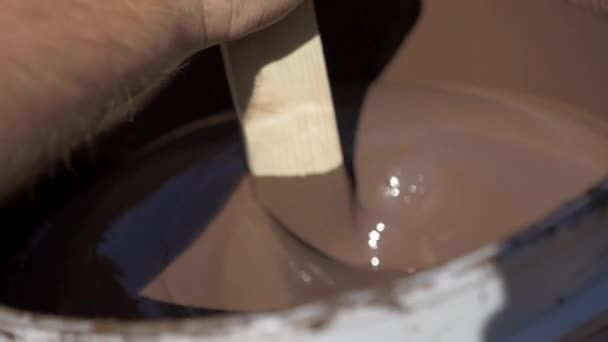 Stirring Large Bucket Paint Wooden Stirring Rod Close Slow Motion — Vídeo de stock