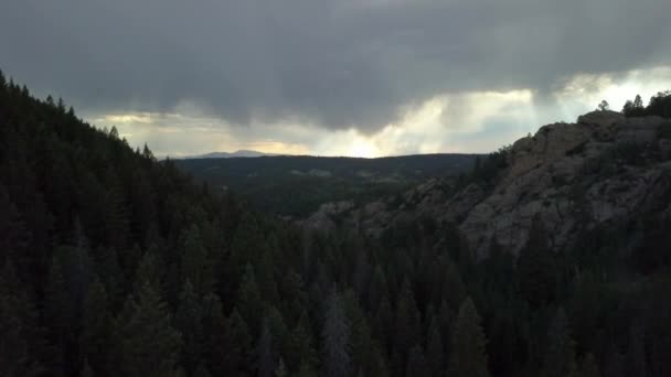 Aerial View Storm Clouds Looming Distance Forested Mountains Colorado Backwards — Vídeo de Stock