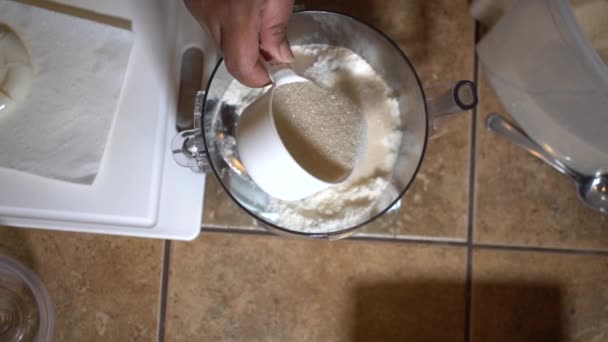 Slowmo Overhead View Adding Cup Sugar Flour Mix — Stock video