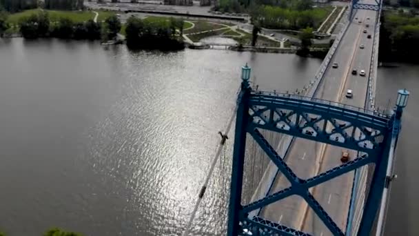 Drone Flying Circling Bridge Cars Driving Canoe River — Stockvideo