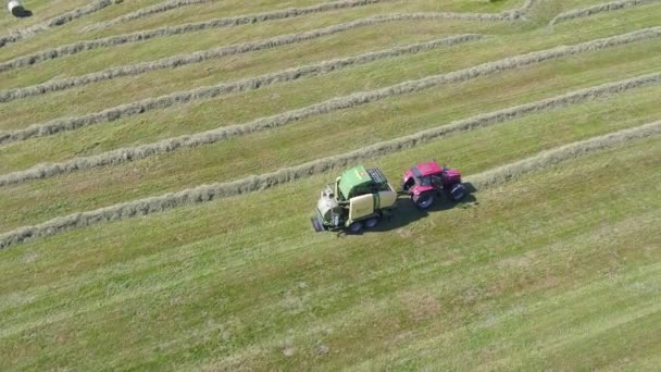 Aerial Shot Tractor Making Hackstacks Swiss Countryside — Stockvideo