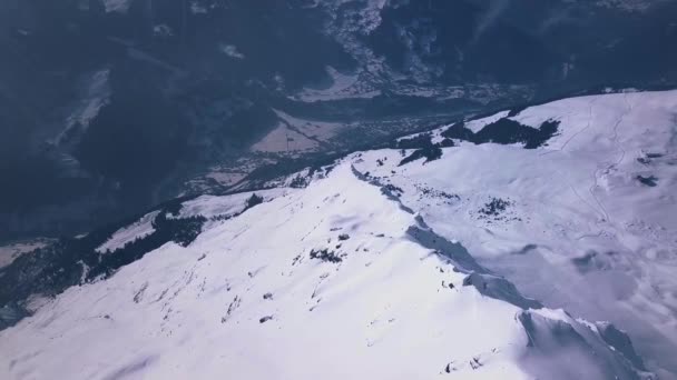 Aerial Drone Footage Flying Snowy Mountain Peak Ski Resort Town — Stock video