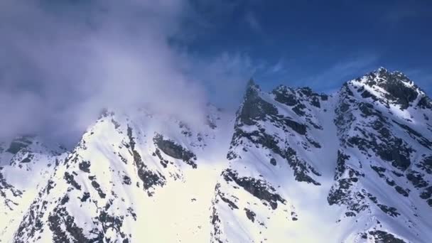 Aerial Drone Shot Snow Covered Mountain Peaks Shrouded Mist Ski — Video Stock