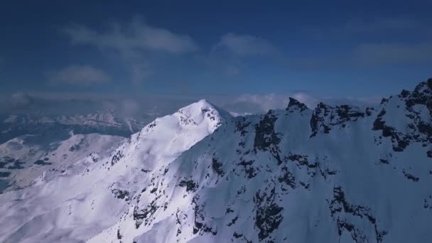 Aerial Drone Shot Flying Tall Snow Covered Mountain Range Vacation — 图库视频影像