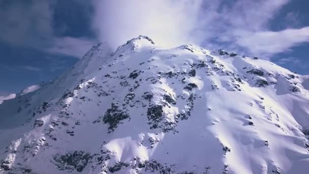 Aerial Drone Shot White Snowy Peak Alps Mountains Vacation Resort — Stockvideo