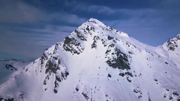 Aerial Drone Shot Rising Snow Covered Peak Ski Resort Town — Stock video