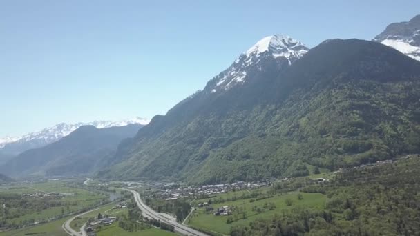 Aerial Drone Shot Valley Roads Towns Snow Covered Mountains Lavey — Stockvideo