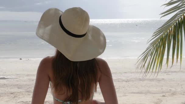 Young Woman Bikini Hat Tropical Beach Looking Ocean Ultra Slow — Stok video