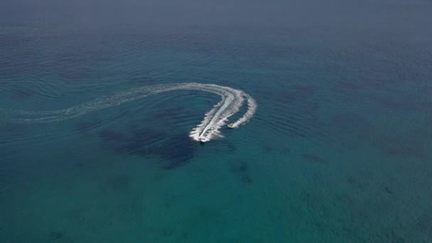 Aerial Drone Tracking Shot Speedboat Pulling Tube Aegean Sea Paros — Wideo stockowe
