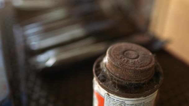 Old Rusty Forgotten Adhesive Can Applicator Covered Cobwebs Storage Shelf — Vídeo de Stock