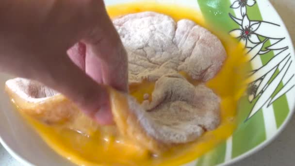Male Hands Turning Flour Coated Schnitzel Egg Wash Slow Motion — Stock videók