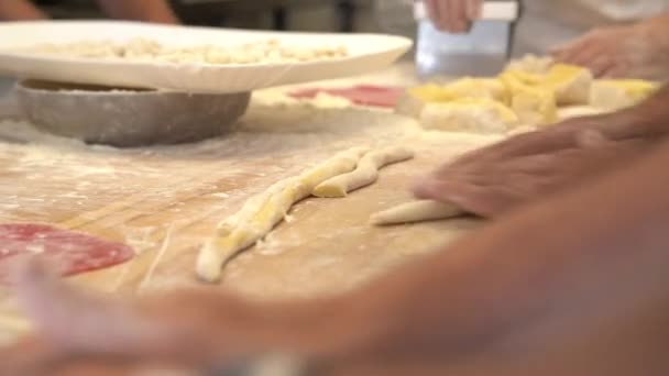 Human Hands Modelling Making Typical Type Italian Pasta Wood Table — Stockvideo