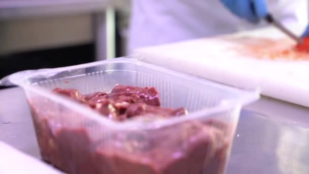 Human Hands Latex Gloves Cutting Slices Tomatoes Wood Table Kitchen — Stock Video