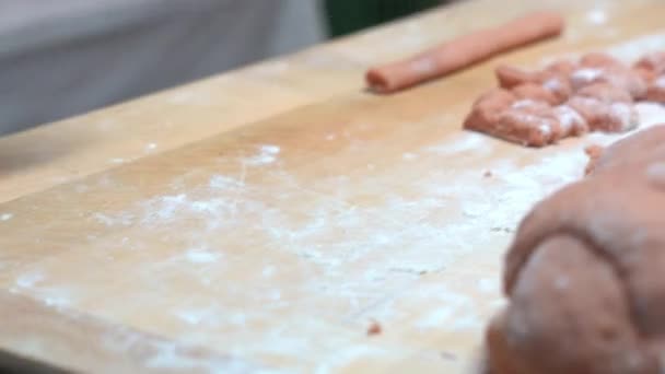 Hands Grasp Knife Cuts Small Pieces Pasta Wood Table — Vídeo de Stock