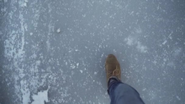 First Person View Man Boots Sliding Frozen Pond Ice Slowmo — Video