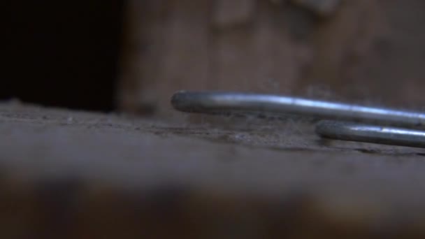 Extreme Close Panning Shot Paperclip Sits Ledge — Stock video