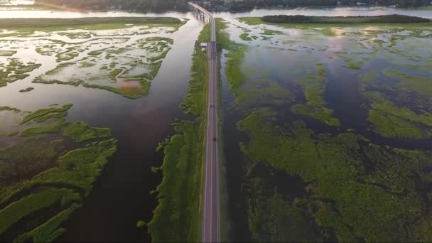 Drone Flying Causeway Revealing Bridge Sunset Ocean Isle Beach — Stock video