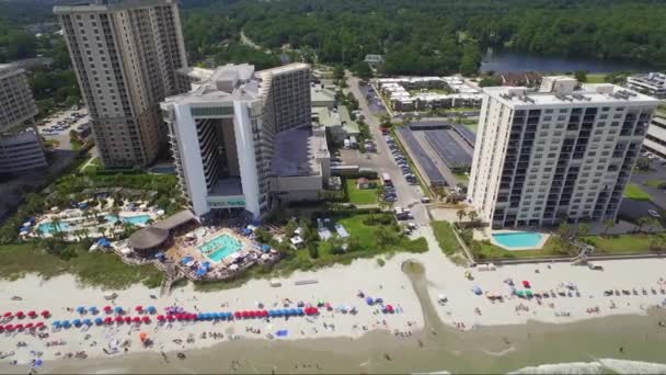 Panning Shot Several Ocean Front Resorts — Stockvideo