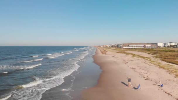 Man Fishing Beach Oak Island — Vídeo de stock