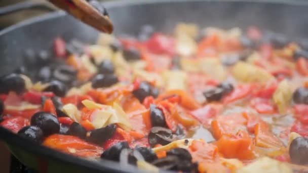 Closeup Traditional Way Cooking Paella Vegetarian One Olives Tomatoes Onions — Videoclip de stoc