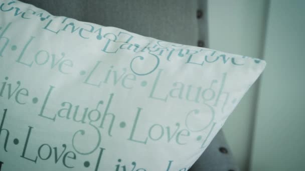 Live Laugh Love Pillow Couch — стоковое видео