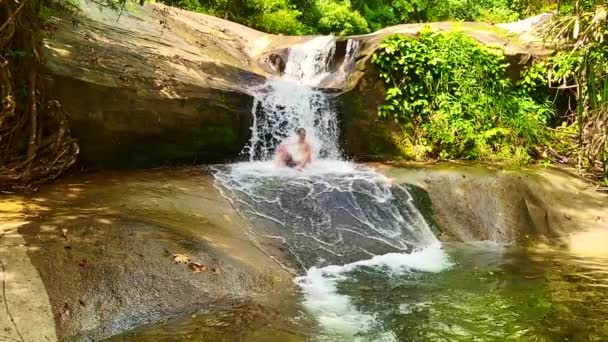 Shot Happy Man Sliding Playing Water Falls — 비디오