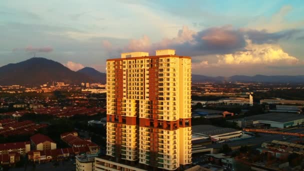 Aerial Shot High Rise Building Surrounded Low Rise Homes Sunset — 비디오
