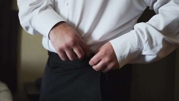 Groom Putting Pants Getting Ready His Wedding Day — Stockvideo