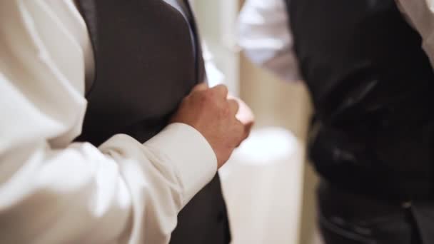 Groom Buttoning His Black Suit Vest Slow Motion — Vídeo de Stock