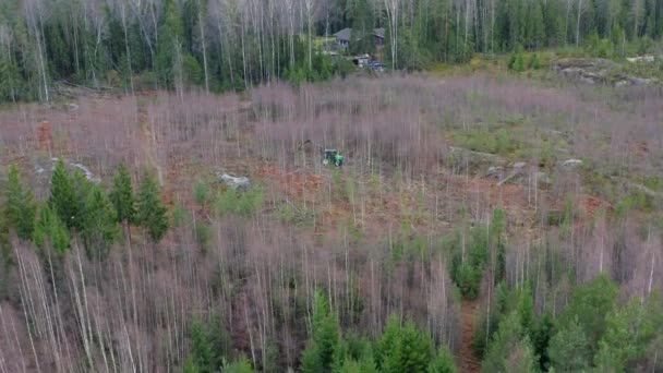 Drone Footage Green Tractor Cutting Trees — Stockvideo