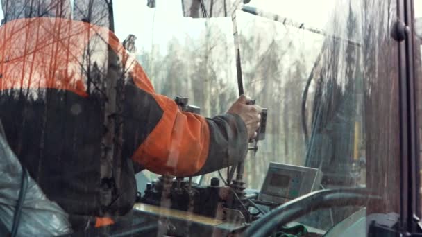 Man Operating Saw Tractor — kuvapankkivideo