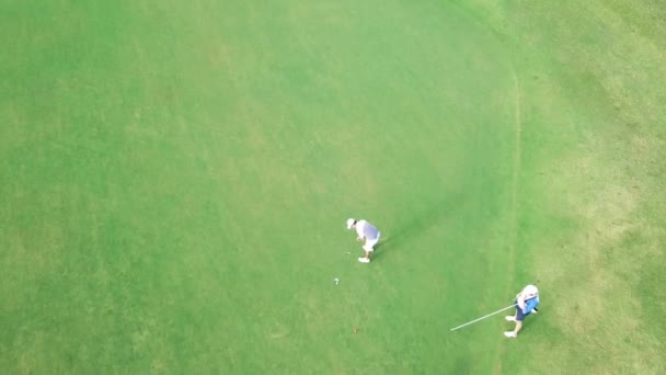 Couple Golfers Making Some Bad Putts — 图库视频影像