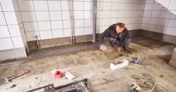 Timelapse Two House Builders Laying Floor Tiles Technology Room — Vídeo de stock