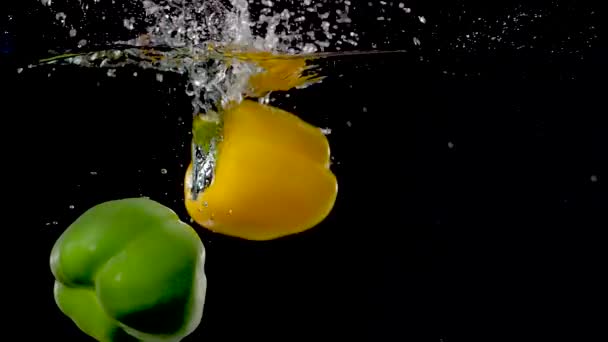 Vibrant Bell Peppers Being Dropped Water Slow Motion — Video Stock