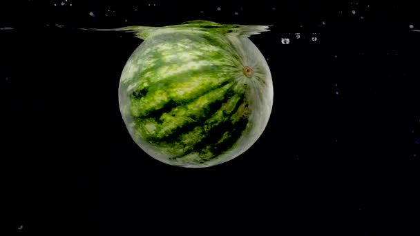 Colorful Vibrant Watermelon Being Dropped Water Slow Motion — Stock video