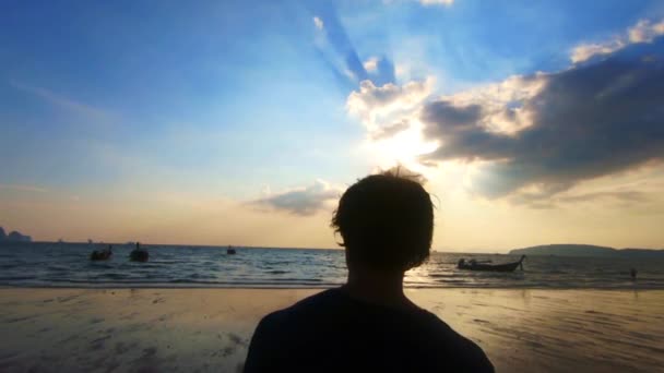 Man Filmed Walking Beach Slow Motion Sunset — Vídeo de Stock