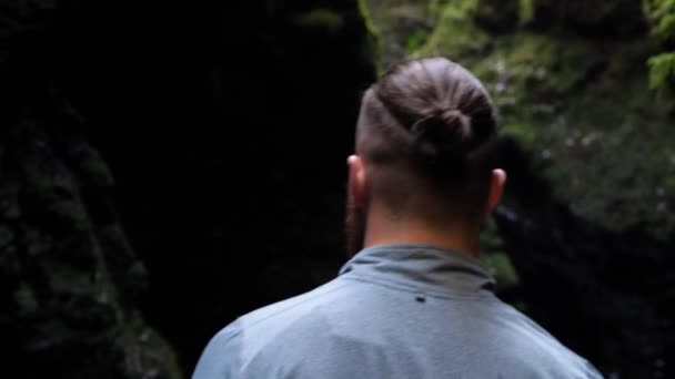 Back View Young Man Slowly Walking Further Shadowy Ravine — Wideo stockowe