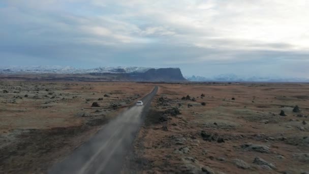 Drone Video Car Driving Away Dirt Road Iceland — Stockvideo