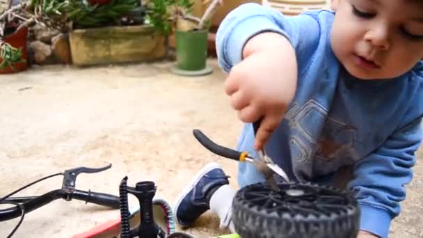 Charming Cute Little Boy Playing Repairman His Bicycle — Stock Video