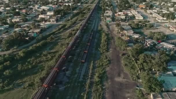 Aerial Freight Train Passing Mexican Northern Countryside — Stockvideo