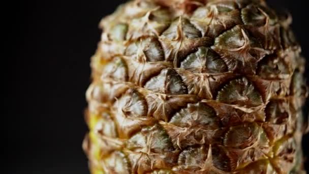 Panning Shot Top Rotating Fresh Pineapple Fruit Isolated Black Background — Stockvideo