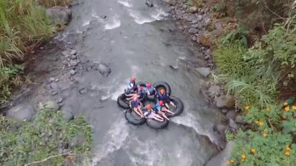 People Having Fun Doing Tubing Mindo River Safety Accessories — Vídeos de Stock
