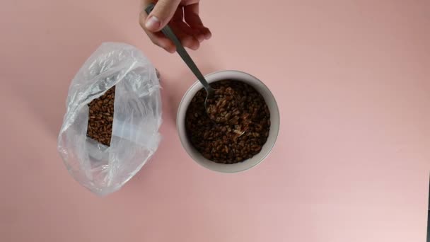 Top View Returning Chia Seeds Cup Plastic Bag — Stock video