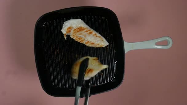Top View Turning Cooked Greased Chicken Breast Fillet — Stockvideo