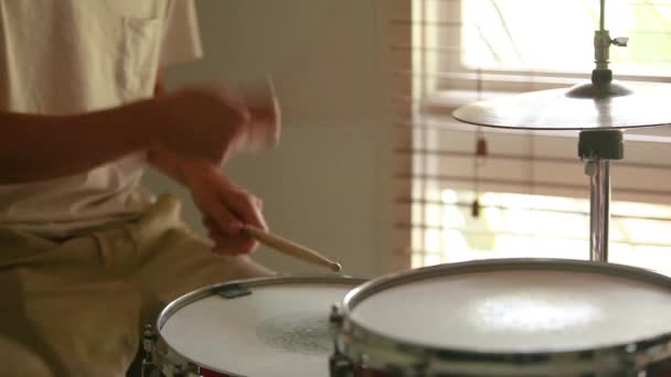 Drummer Practicing Ghost Note Rudiments Natural Light Coming Window Angled — Vídeo de Stock